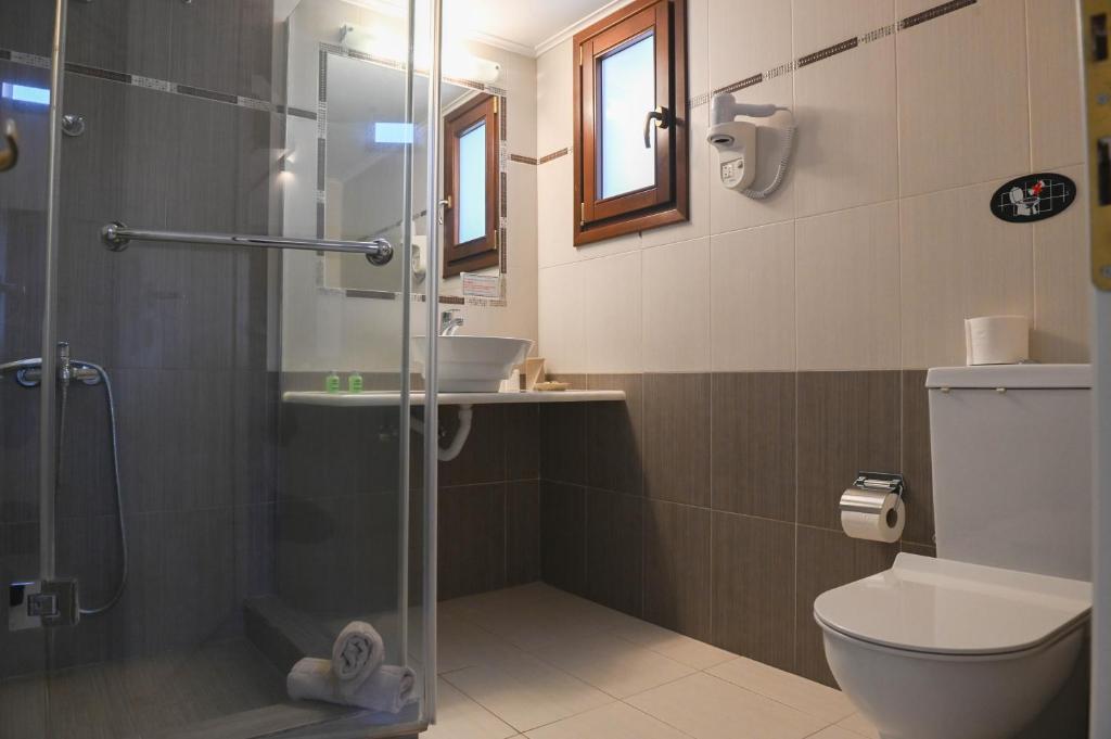 Koupelna v ubytování Amerisa Suites & Villa