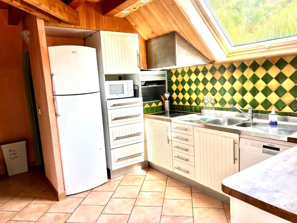 Kuchyňa alebo kuchynka v ubytovaní * Magnifique Chalet entre les pistes et la ville *