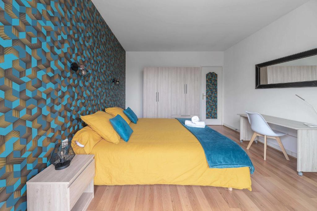 Posteľ alebo postele v izbe v ubytovaní Le Pasteur - Grand appartement lumineux - Centre-ville