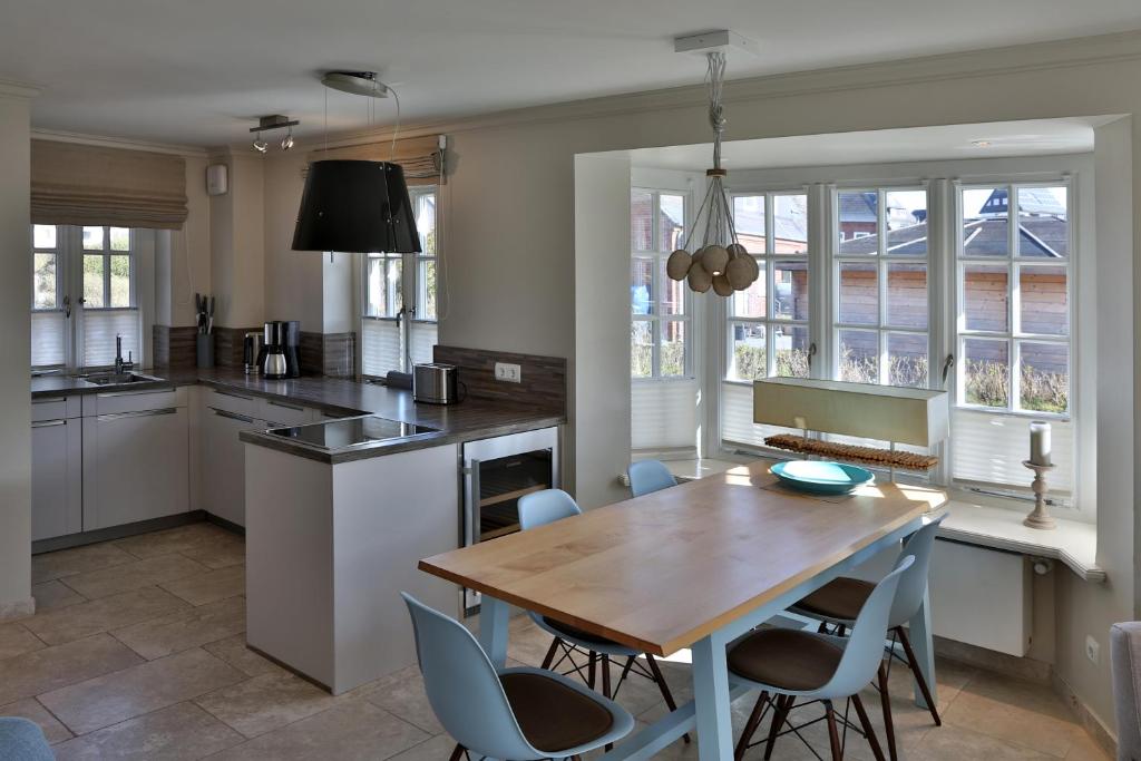 Kuchyň nebo kuchyňský kout v ubytování Apartmenthaus Budersandstraße 53
