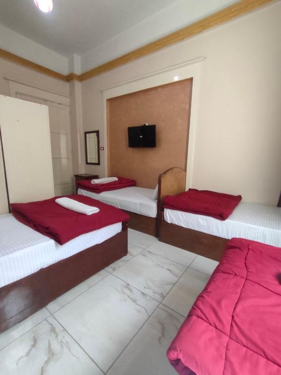 Postel nebo postele na pokoji v ubytování Miami Hotel