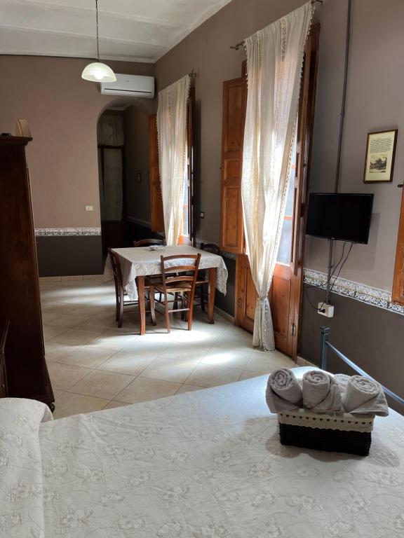 Postel nebo postele na pokoji v ubytování B&B Su Maimoni
