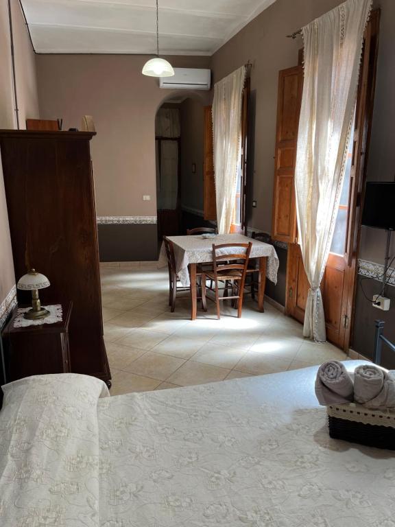 Postel nebo postele na pokoji v ubytování B&B Su Maimoni