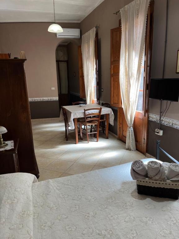Postel nebo postele na pokoji v ubytování B&B Su Maimoni