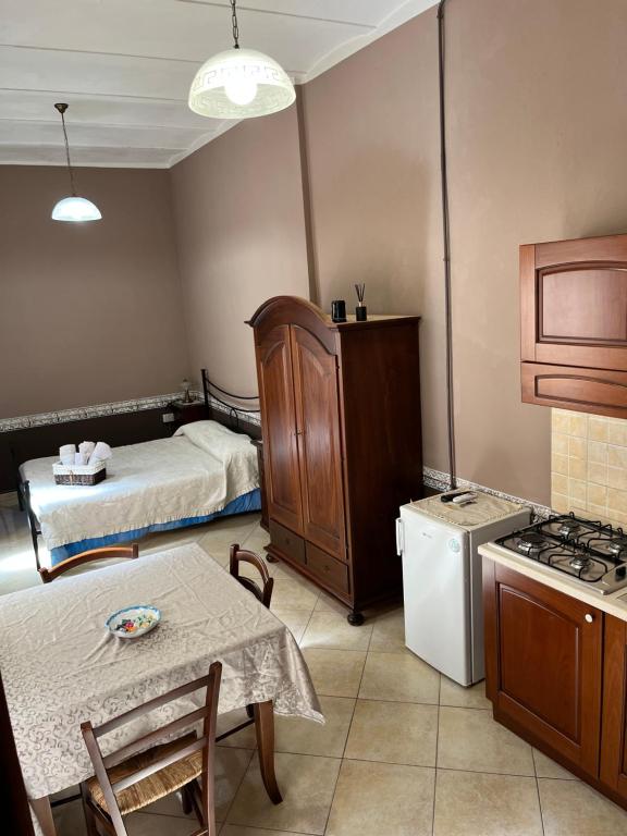 Kuchyň nebo kuchyňský kout v ubytování B&B Su Maimoni