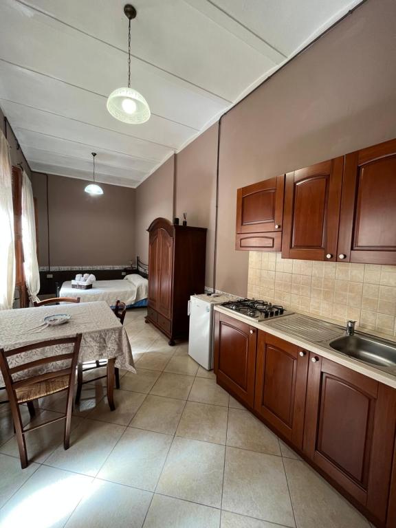 Kuchyň nebo kuchyňský kout v ubytování B&B Su Maimoni