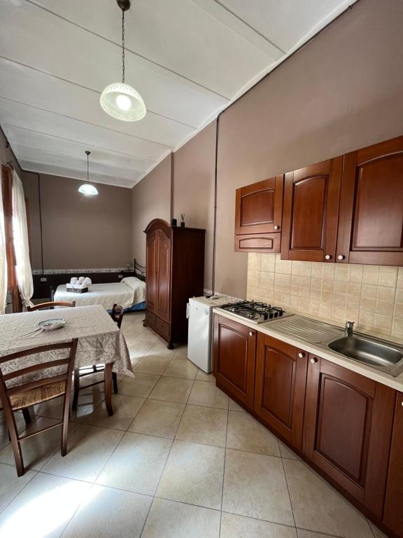 Kuchyň nebo kuchyňský kout v ubytování B&B Su Maimoni