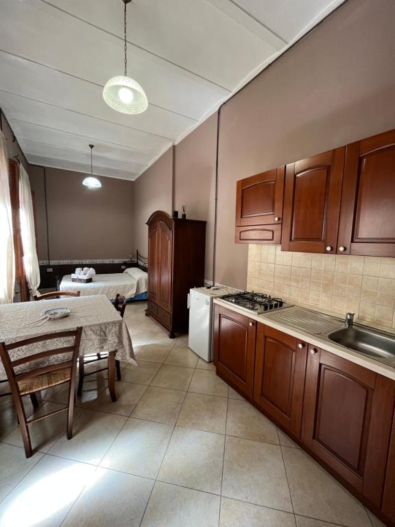 Kuchyň nebo kuchyňský kout v ubytování B&B Su Maimoni