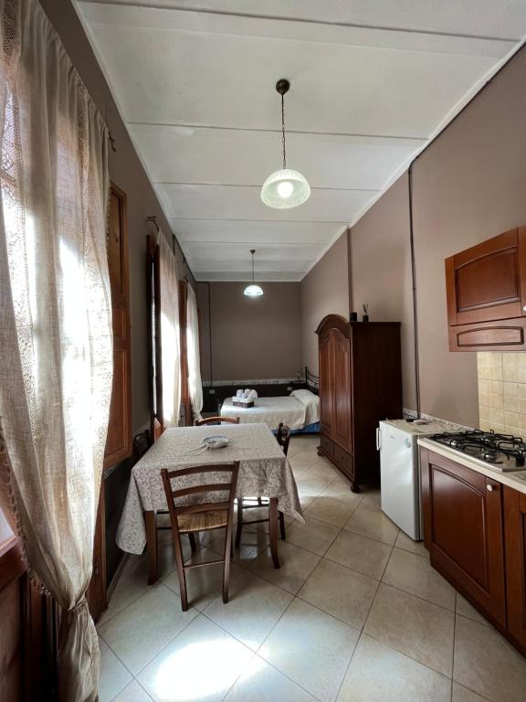Kuchyň nebo kuchyňský kout v ubytování B&B Su Maimoni