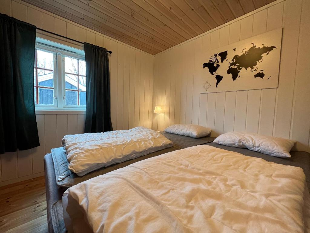 Postel nebo postele na pokoji v ubytování Trollstigen Resort