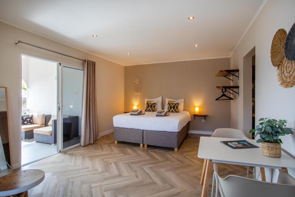 Postel nebo postele na pokoji v ubytování PUUR! Appartementen Curaçao