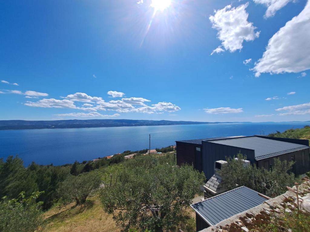 a view of a lake from a building at Bella vista with jacuzzi in Omiš