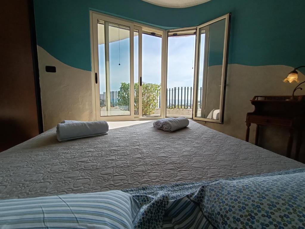 A bed or beds in a room at VILLA TAI