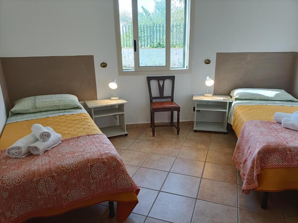 A bed or beds in a room at VILLA TAI