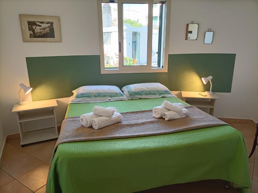 A bed or beds in a room at VILLA TAI