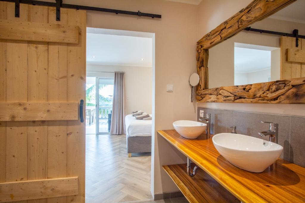 Koupelna v ubytování PUUR! Appartementen Curaçao