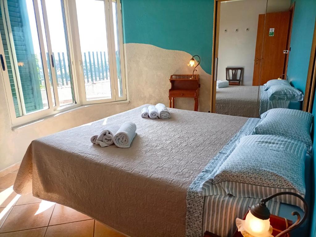 A bed or beds in a room at VILLA TAI