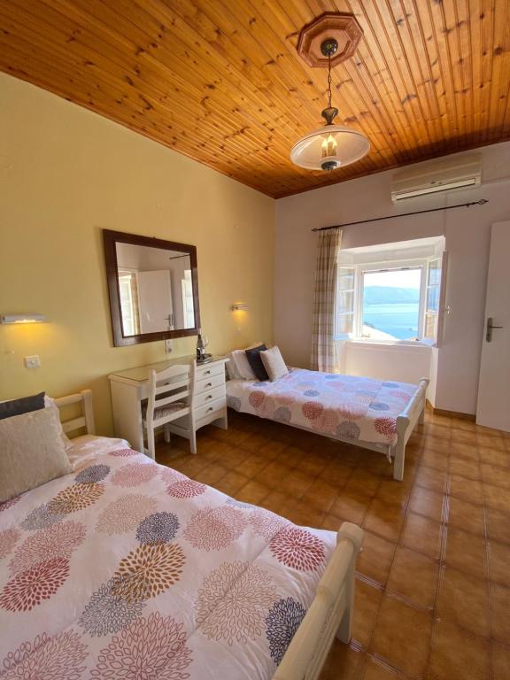 Postel nebo postele na pokoji v ubytování Villa Chrysoula