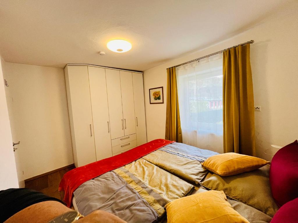 Postel nebo postele na pokoji v ubytování Ferienhaus Sausalblick