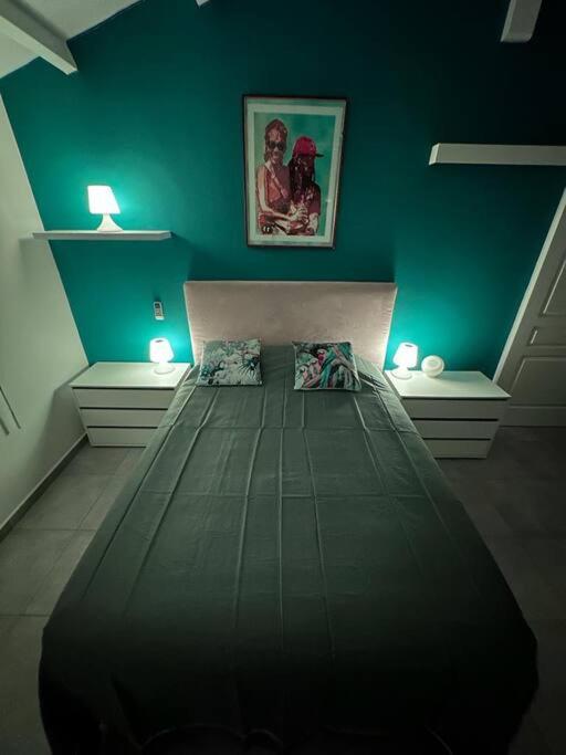 Postel nebo postele na pokoji v ubytování Maison élégante F2 Le Pitaya