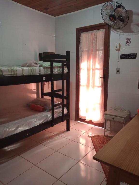 Postel nebo postele na pokoji v ubytování Albergue Muzy