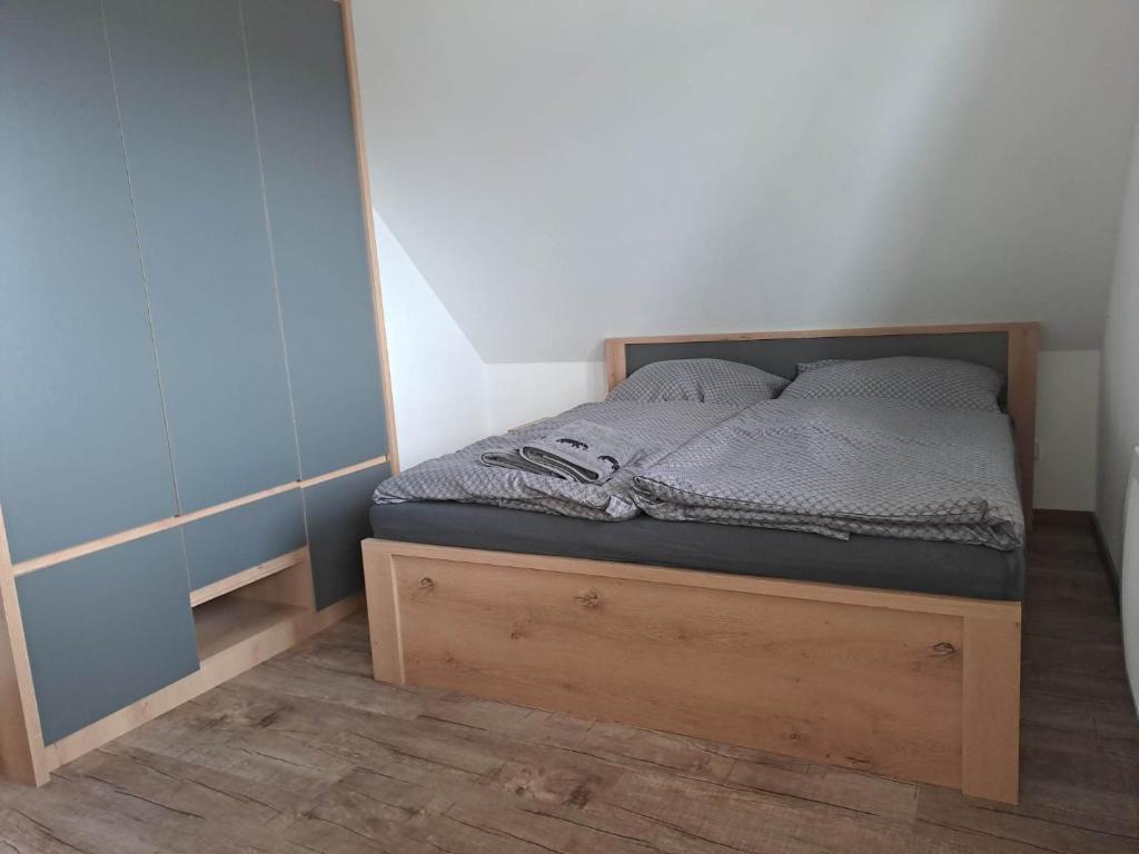Postel nebo postele na pokoji v ubytování Chata Štíty