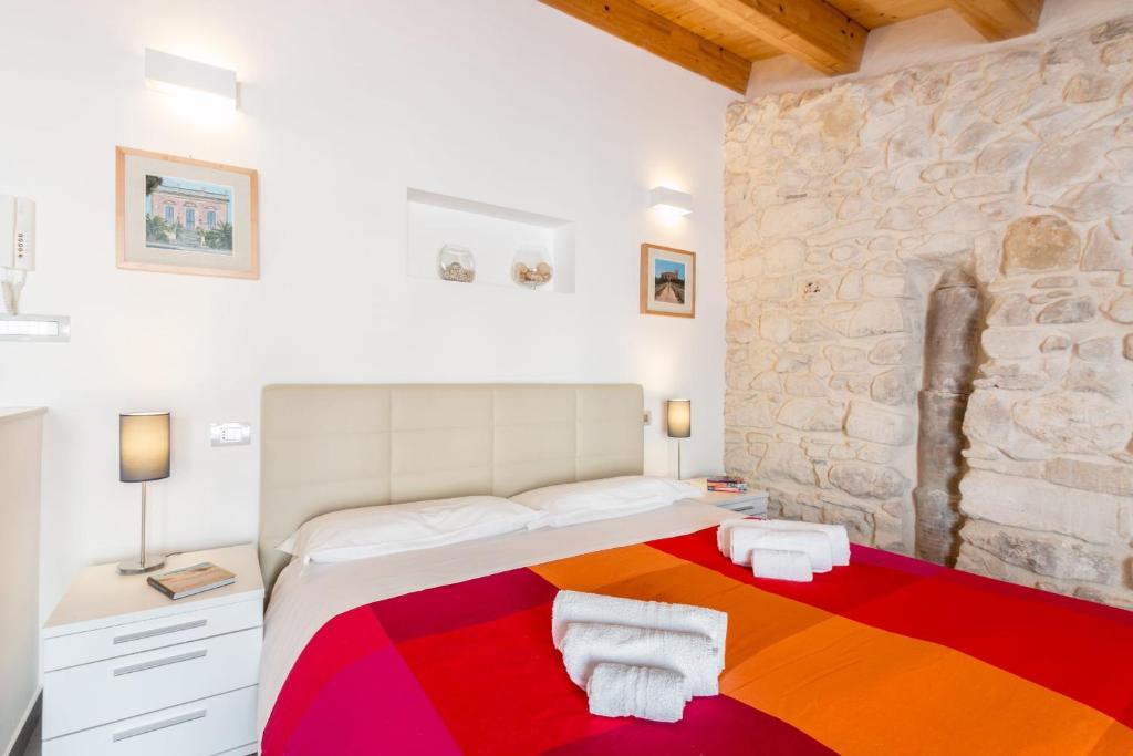 Postel nebo postele na pokoji v ubytování B&B Bianco E Blu