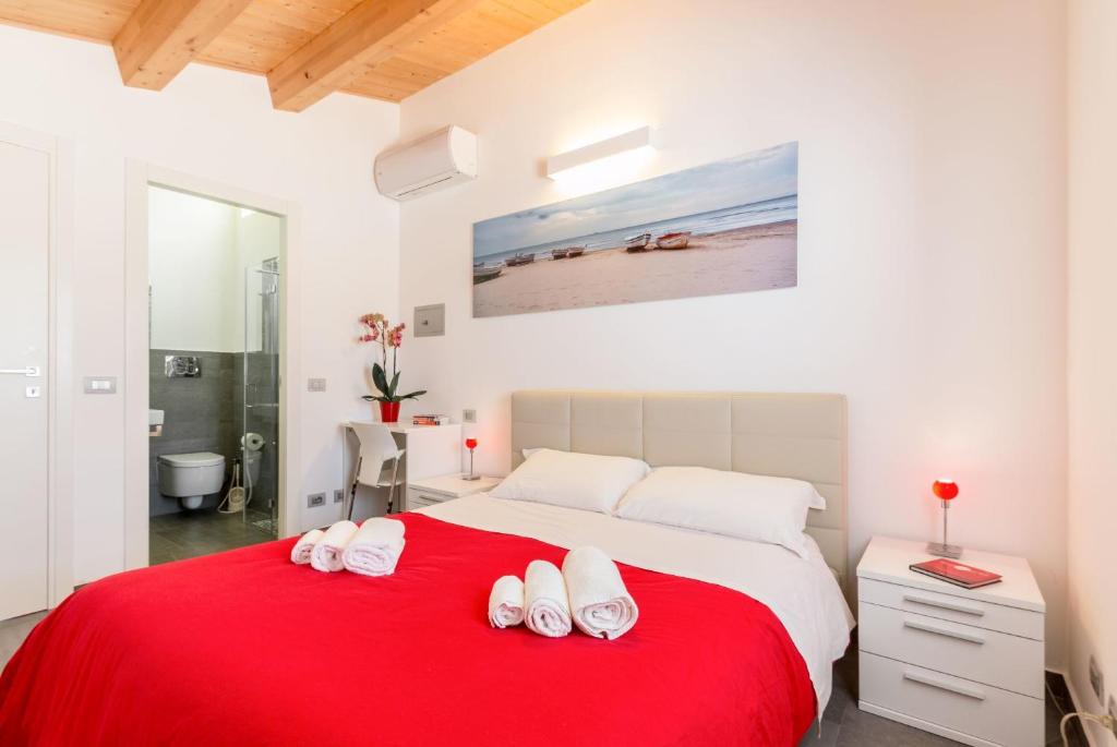 Postel nebo postele na pokoji v ubytování B&B Bianco E Blu