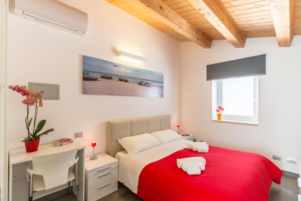 Postel nebo postele na pokoji v ubytování B&B Bianco E Blu