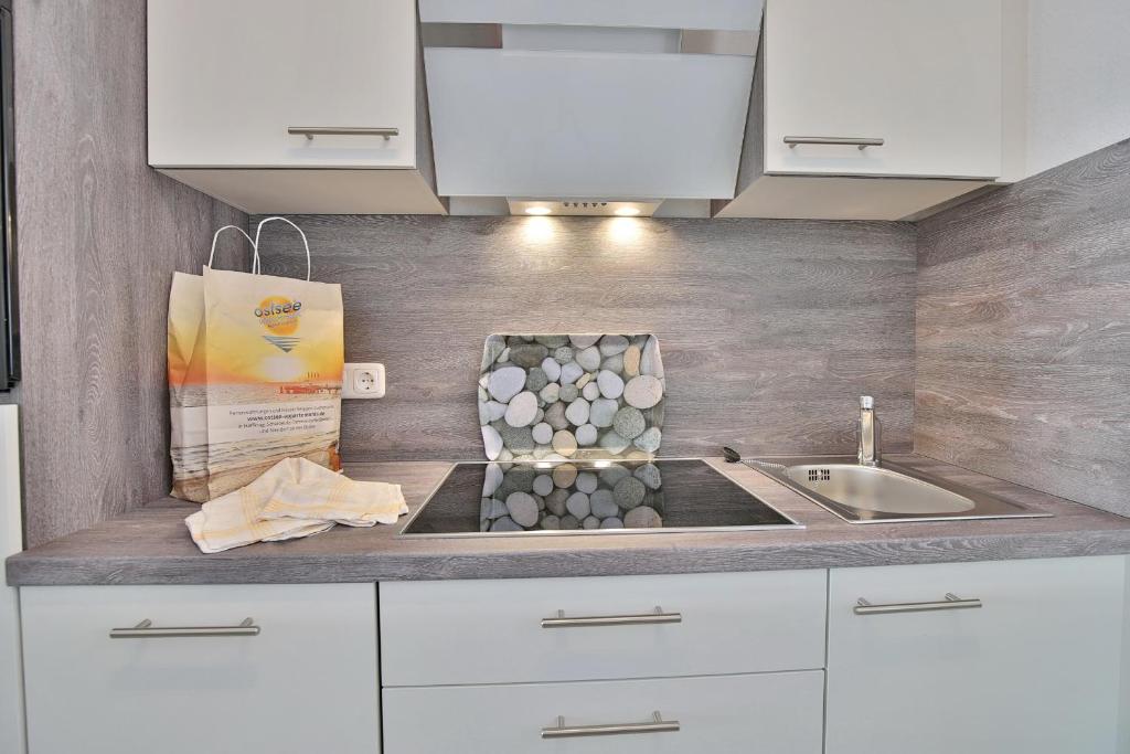 Kuchyň nebo kuchyňský kout v ubytování Strandburg Strandburg Appartement 1
