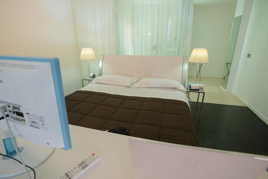 Postel nebo postele na pokoji v ubytování Hotel iDesign