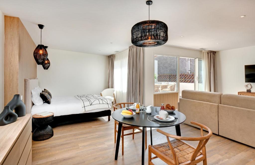Posteľ alebo postele v izbe v ubytovaní Les Appartements de Collioure