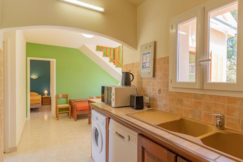 Kuchyň nebo kuchyňský kout v ubytování Residence Mare e Sole