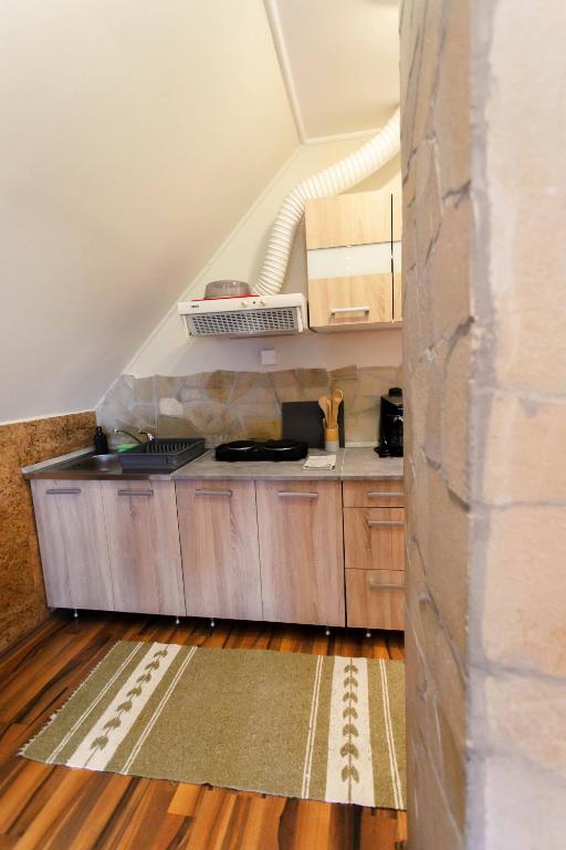 Kuchyň nebo kuchyňský kout v ubytování LiBe Apartman
