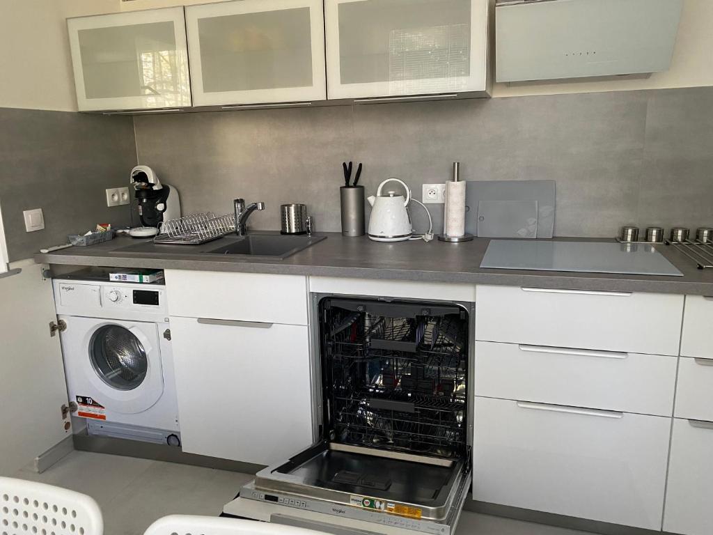 Kuchyň nebo kuchyňský kout v ubytování Apartmán Nitra