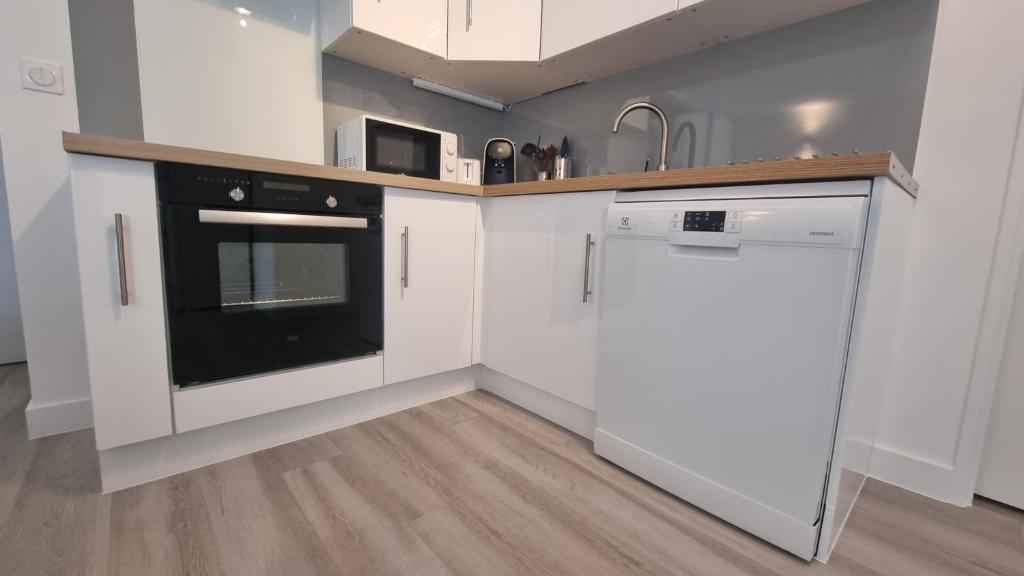 Kuchyň nebo kuchyňský kout v ubytování Résidence Anthérieu - Appartements neufs tout confort