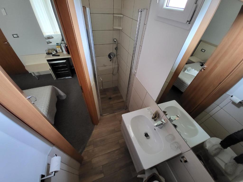 Koupelna v ubytování Hotel Garni Rosmari
