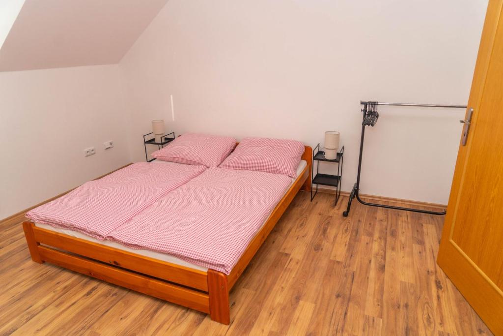 Postel nebo postele na pokoji v ubytování Apartmán Tereza