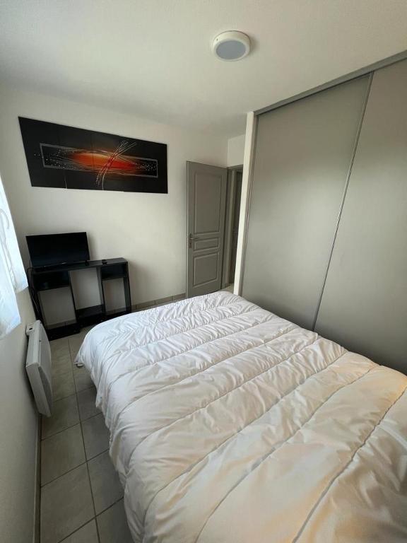 Postel nebo postele na pokoji v ubytování HARMONIE