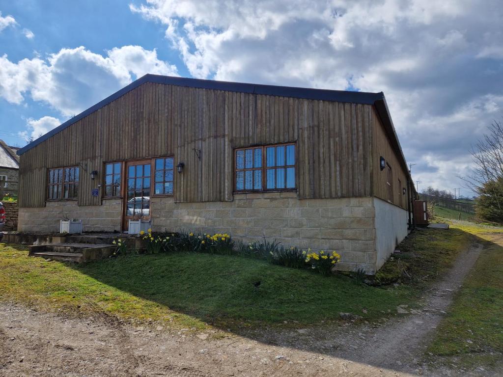 Κήπος έξω από το The Den, Coves House