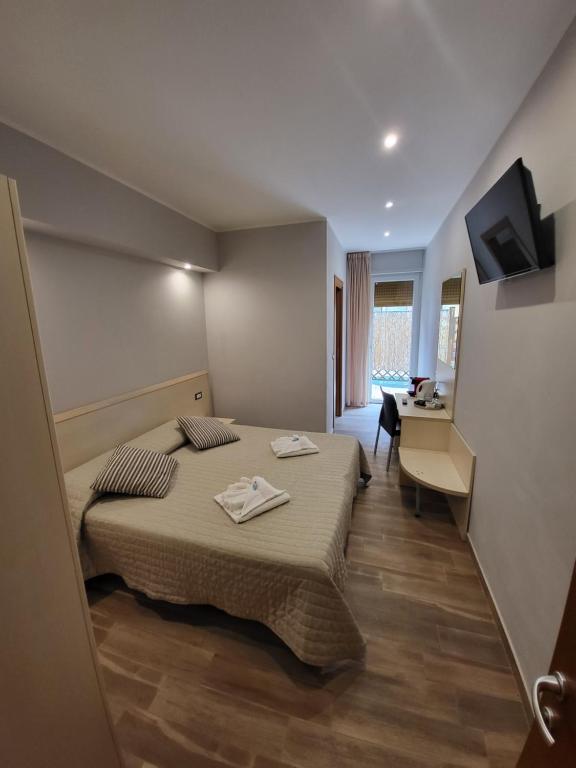 TV a/nebo společenská místnost v ubytování Hotel Garni Rosmari