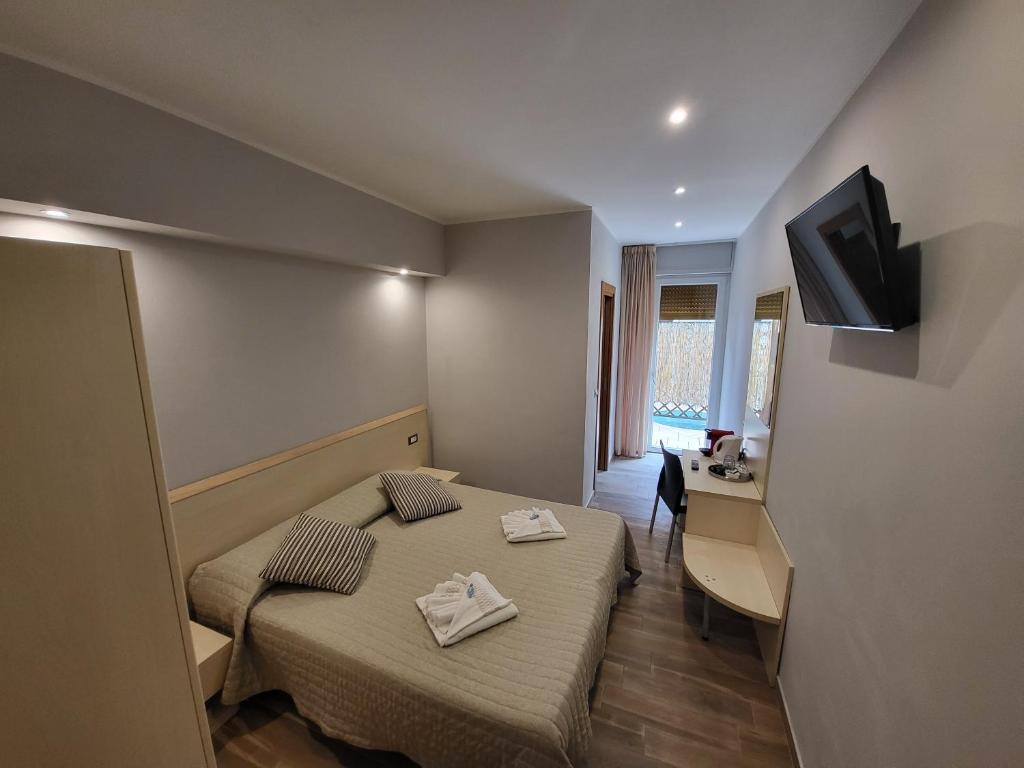 TV a/nebo společenská místnost v ubytování Hotel Garni Rosmari