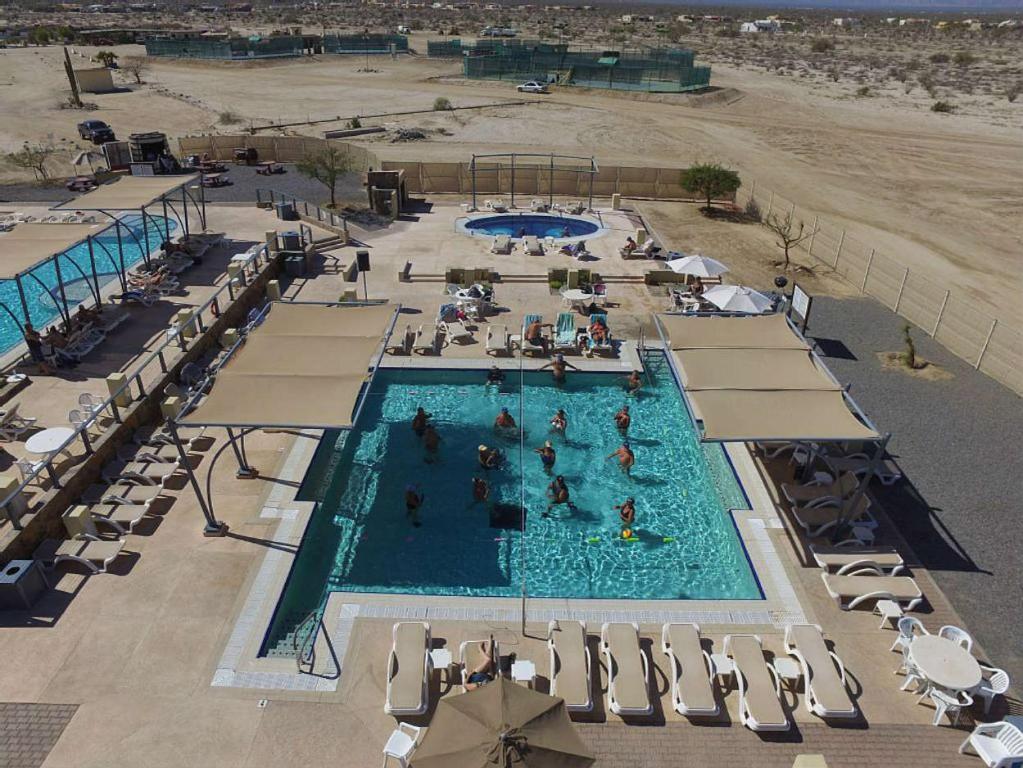 an overhead view of a swimming pool at a resort at El Dorado Ranch San Felipe Rental - Judy`s Casita in Playa El Paraíso