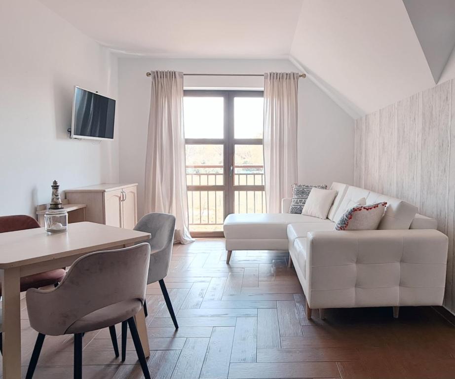 Posedenie v ubytovaní Apartamenty Sasinówka