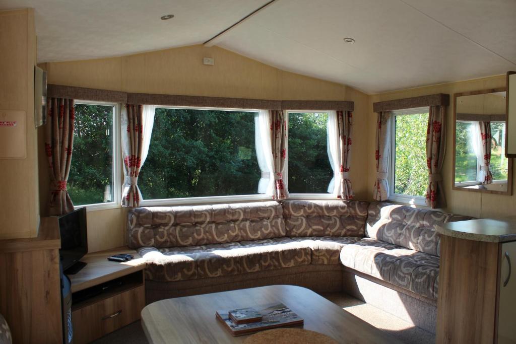 Posezení v ubytování Crannich Holiday Caravans