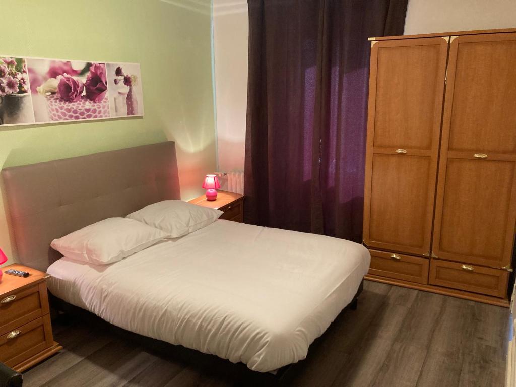 Postel nebo postele na pokoji v ubytování Aigle d'Or