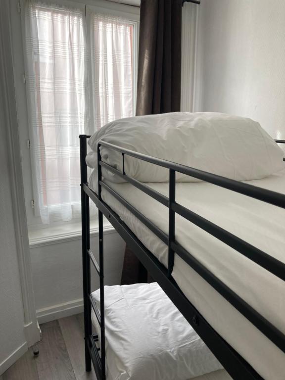 Postel nebo postele na pokoji v ubytování Aigle d'Or
