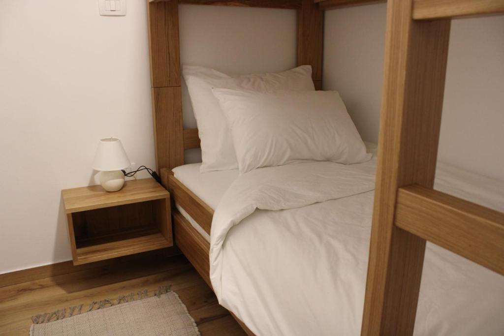 Postel nebo postele na pokoji v ubytování G House