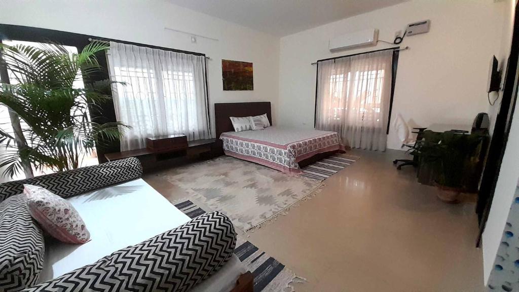 Postel nebo postele na pokoji v ubytování Sublime Homestay