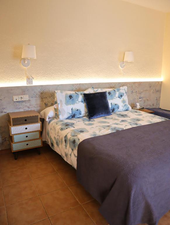 Posteľ alebo postele v izbe v ubytovaní Hotel Sant Joan